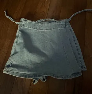 Celebrity Pink Wrap around Jean skirt thumbnail 1