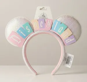 NWT Disney Resorts Pastel Disneyland Marquee Sparkling White Ear Headband 3-2026 thumbnail 1