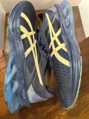 Asics navy and gold performance running sneaker thumbnail 9
