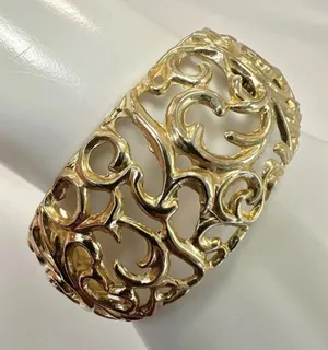 Gold tone cut out hinged bangle bracelet thumbnail 1