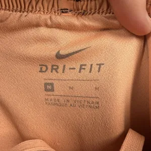 Nike Dri-FIT Running Shorts Womens Medium Black Orange Elastic Waist 3" Inseam thumbnail 3