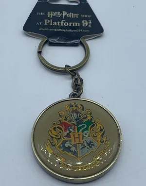 HARRY POTTER Hogwarts house crest and platform 9 3/4 keychain new in pac… thumbnail 1