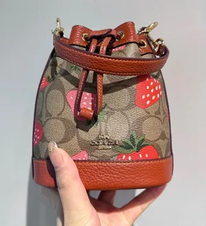COACH Mini Dempsey Bucket Bag In Signature Canvas With Wild Strawberry CH164 thumbnail 1