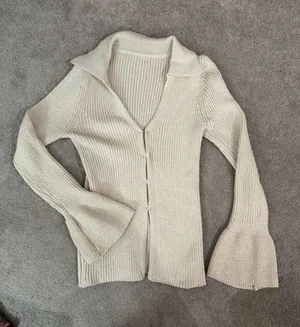 SHEIN Cream Ribbed V-Neck Button Front Sweater with Flared Cuffs thumbnail 1