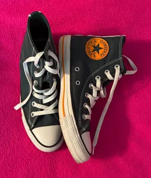 Green converse with orange details  thumbnail 1