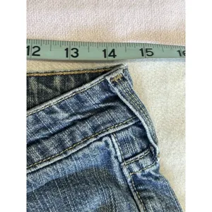 Levi's Misses Cutoff Denim Jean Shorts Med Wash Size 8 Mid Rise Raw Hem‎ Zip thumbnail 7