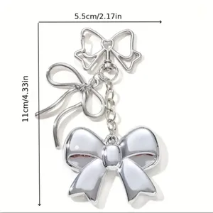 Silver Bow Dangle Earrings Double Ribbon Statement Coquette Chic NWT thumbnail 3