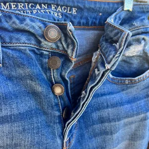 American Eagle Ripped Stretch Jeans thumbnail 4