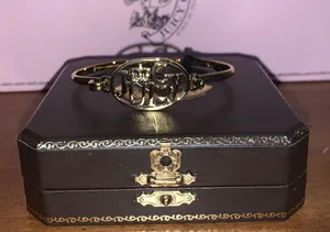 Juicy Couture Retro Pam & Gela Gold Bracelet thumbnail 4