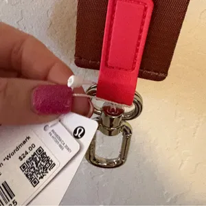 Lululemon Never Lost Keychain Word Mark NWT authentic ancp/glzp/wht thumbnail 4