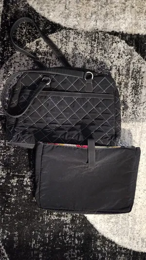 Vera Bradley black diagonal zippered stitch black briefcase/overnight bag with removable laptop sleeve. Bag..15.5" x 11" x 3".. laptop sleeve with velcro closure tab. 14.5" x 10.5" x 2" thumbnail 2