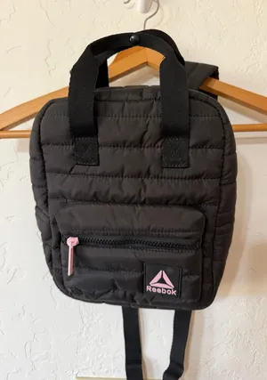 Reebok Poppy Quilted Mini Backpack Black Puffer Daypack Bag Pink Logo thumbnail 1