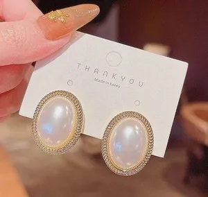 Elegant White Pearl Stud Earrings for Women thumbnail 1