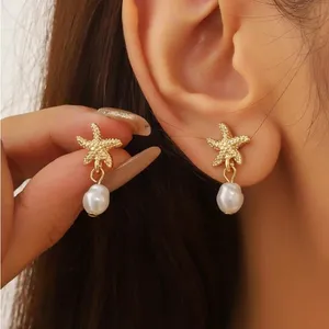Gold Starfish Pearl Earrings thumbnail 2