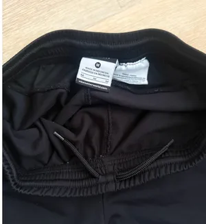 Nike Women’s Dri-FIT Black Zip-Ankle Track Pants M thumbnail 6