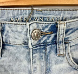 American Eagle Distressed Light Wash High Rise Jegging Size 2 thumbnail 8