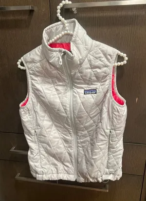 Patagonia Women's Nano Puff Vest in a pale grey‎ women's small thumbnail 1