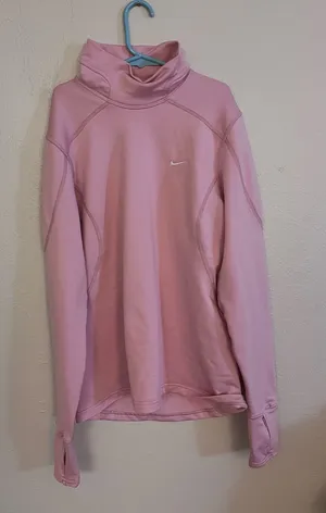 Pink Nike Pro Dri-FIT long-sleeve athletic training top thumbnail 1