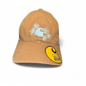 Carhartt Women's Tan adjustable baseball cap with gray embroidered floral logo thumbnail 1