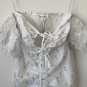 For Love & Lemons X REVOLVE Sand Dollar Mini Dress in White Size: XS thumbnail 4