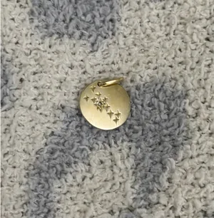 Mejuri Gold Vermeil Taurus Zodiac Charm with white sapphire thumbnail 1