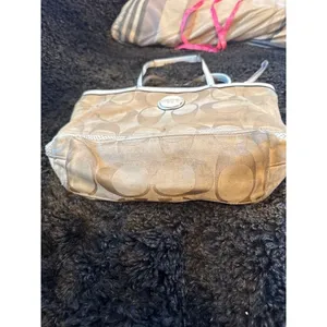 Signature coach bag with accent thumbnail 2