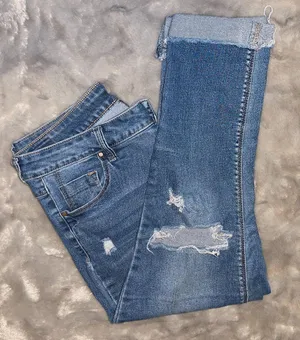 Distressed Blue Denim Jeans – Classic Streetwear Style with Branding Patch thumbnail 1