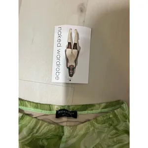 Naked Wardrobe NWT Women Small Green White Marble Swirl Print Mesh Leggings thumbnail 4