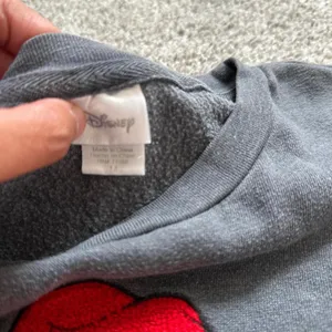 Disney Women's Sweatshirt with Red Mermaid Graphic thumbnail 6