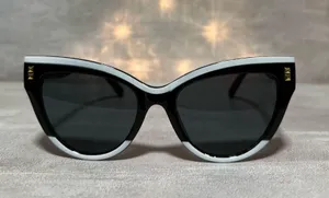 Boutique White and black sunglasses thumbnail 1