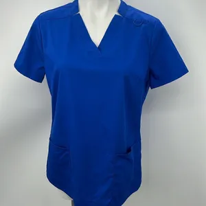 Jaanuu short sleeve V neckline royal blue scrub top with pockets thumbnail 1