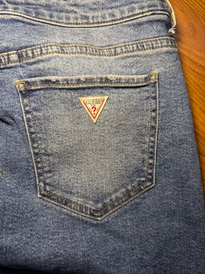 Guess Y2K asymmetrical jean mini skirt raw hem size large. thumbnail 3