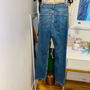 ASOS DESIGN high rise '70's' stretch flare jeans in midwash thumbnail 4