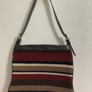 the Sak soft knit multi colored striped crossbody purse. Has a 70s/80s vibe thumbnail 2