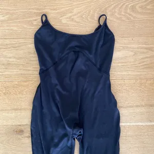 Showpo Merlinda Jumpsuit with Scoop Neckline in Black thumbnail 2