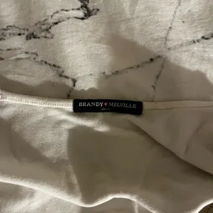Brandy Melville White Cross-Back Crop Top thumbnail 4
