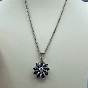Sapphire CZ’ large flower pendant on a long 21” rope chain thumbnail 3