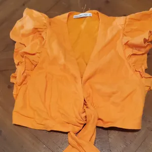 Abercrombie & Fitch Bright Orange Ruffle Sleeve Blouse thumbnail 1