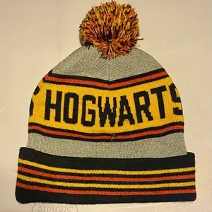 Harry Potter Hogwarts Crest Logo Spell Out Knit Cuff Pom Beanie Hat Cap thumbnail 4