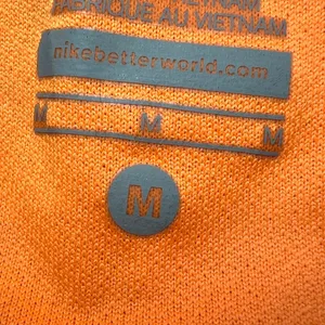 Nike Dri-FIT Womens Size Medium Running Shorts Orange‎ Blue Athletic Gym Workout thumbnail 5
