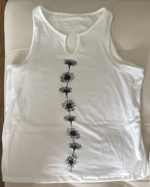White Sleeveless Top with Black Floral Design thumbnail 1