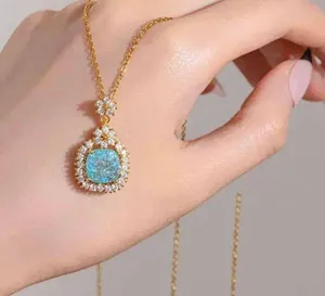 18k Gold Snowflake Necklace Blue thumbnail 1