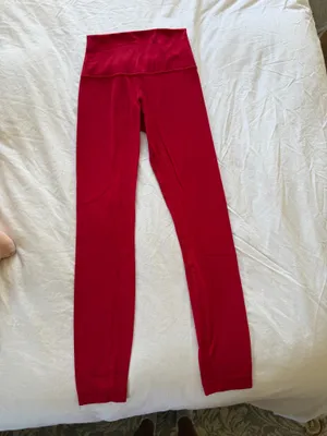 Lululemon red align leggings. Size 2; 25” long. Good condition with little peeling. Hung dry every wash thumbnail 3
