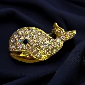 Gold tone rhinestone whale brooch thumbnail 1