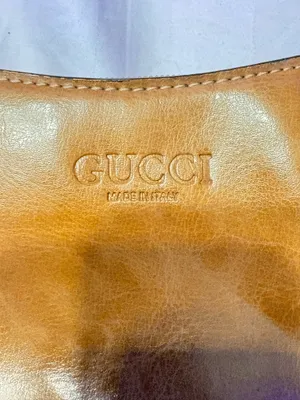 Trendy 90s/early 2000s style baguette purse in a warm camel/tan color. Perfect minimalist everyday bag that fits comfortably under the arm. thumbnail 3