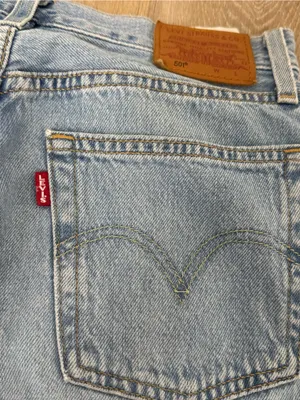 Levi’s Light Blue Distressed Straight-Leg Jeans thumbnail 8
