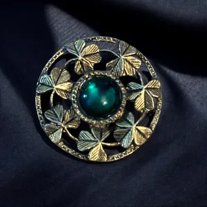 Vintage gold tone shamrocks and green cabochon stone brooch thumbnail 1