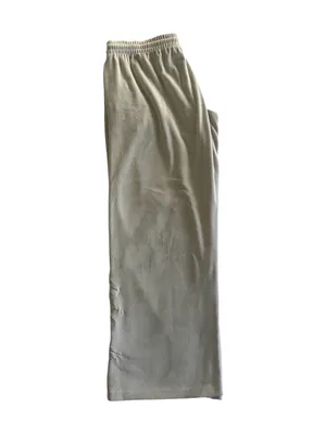 PINK Victoria's Secret Cream Velour Lounge Pants-size large Casual lounge pants from PINK by Victoria's Secret. Elastic drawstring waistband for a comfy fit. Smooth fabric with a relaxed wide-leg silhouette, has hand pockets, embroidered “pink” on one leg, 93% polyester and 7% elasttane, excellent condition Measurements: Waist: side to side 17-21 inches Rise: 11 inches Inseam: 30 inches thumbnail 6