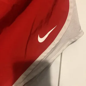 Nike Dri-Fit Women Size Medium Red/White Shorts thumbnail 2