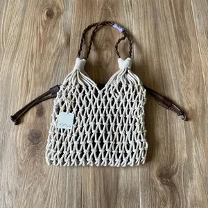 Free People Ivory Macrame Crochet Bucket Bag Boho Drawstring Tote NWT thumbnail 2